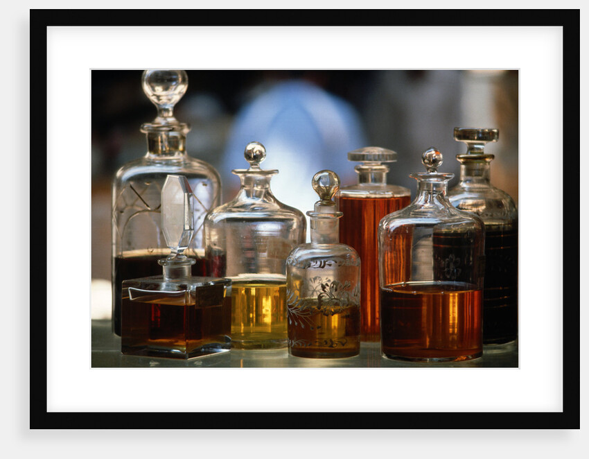 Display Of Perfume Bottles In Market by Anonymous