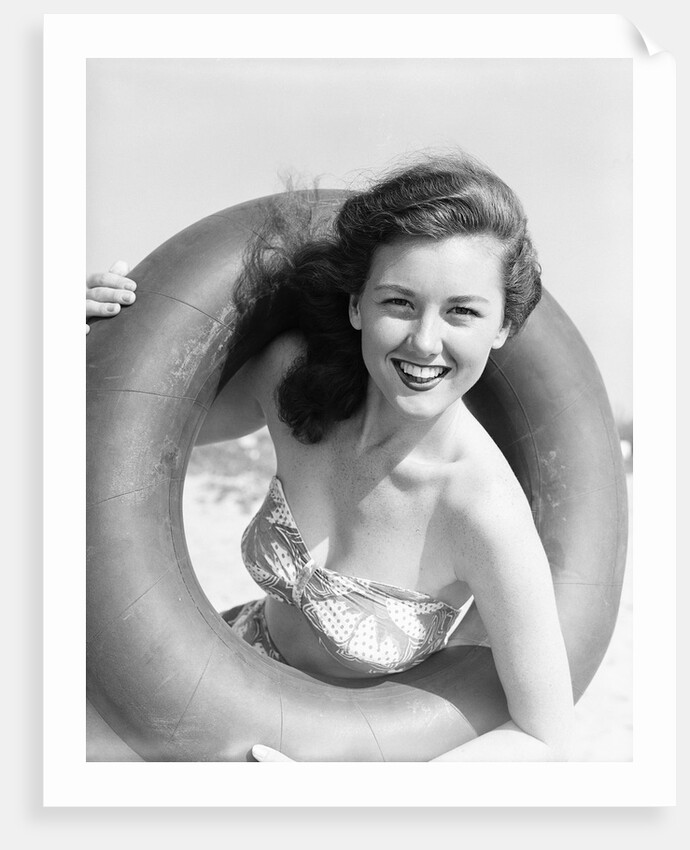Woman with Head Through Inner Tube by Anonymous