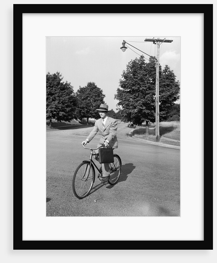Business Man Riding Bicycle by Anonymous