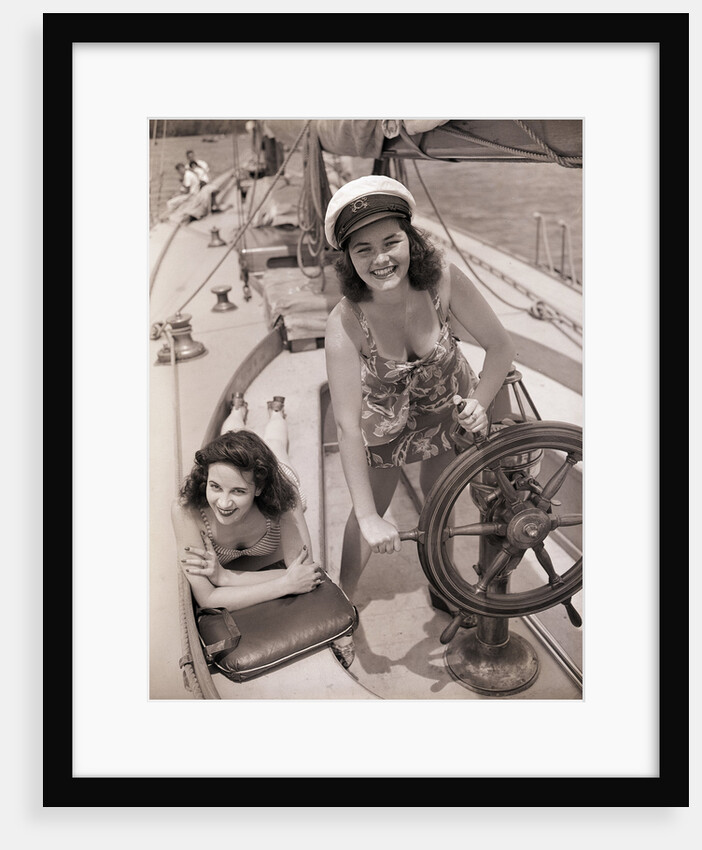 Women at the Helm of Sailboat by Anonymous