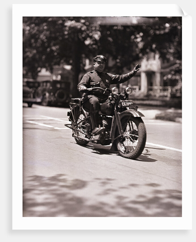 Police Officer On Motorcycle by Anonymous