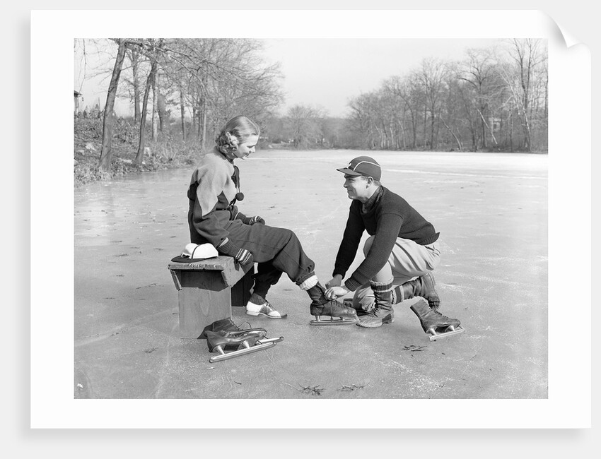 Man Lacing a Woman's Ice Skate by Anonymous