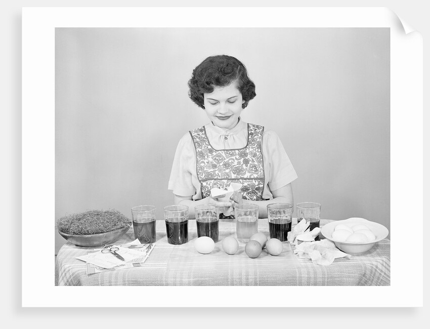 Woman Coloring Easter Eggs by Anonymous