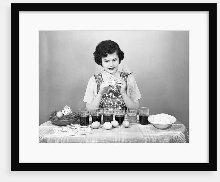 Woman Coloring Easter Eggs with a Paintbrush by Anonymous