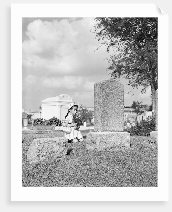 Girl Kneels at Headstone by Anonymous