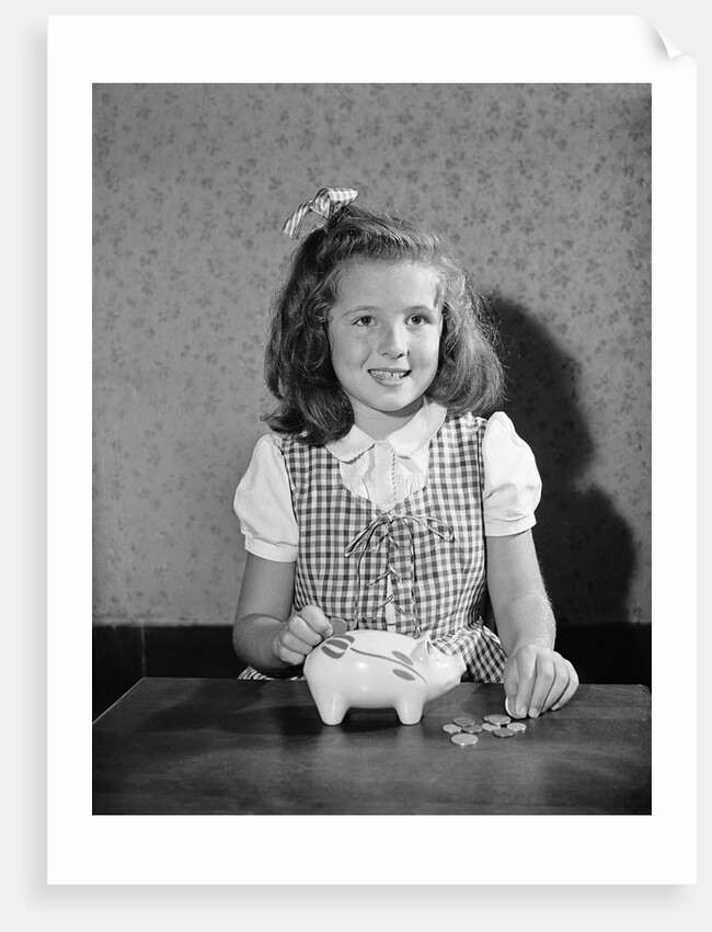 Girl Putting Money In Piggy Bank by Anonymous