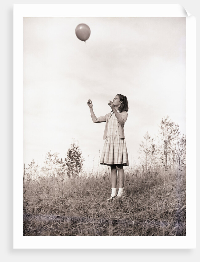 Girl Holding a Balloon by Anonymous