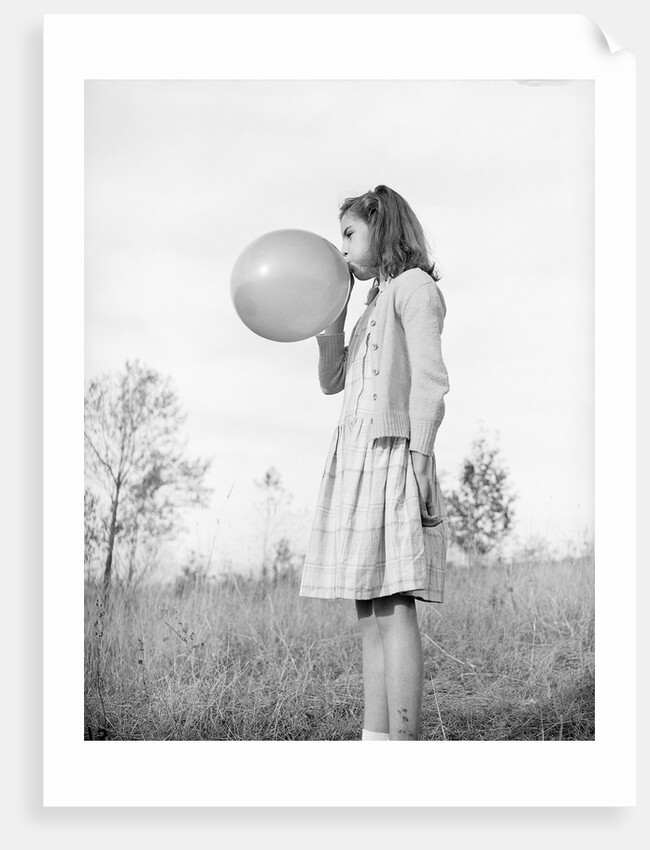 Girl Blowing a Balloon by Anonymous