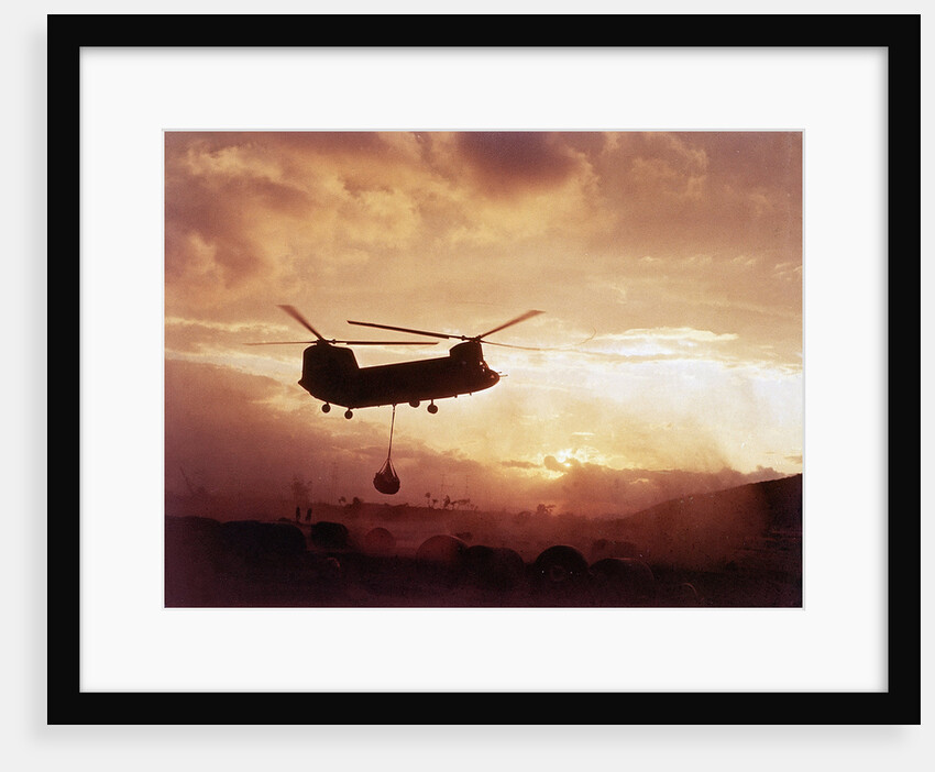 Chinook Helicopter Lifts Ammunition by Anonymous