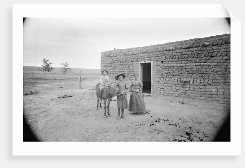 Women and Child Outside Ranch House by Anonymous