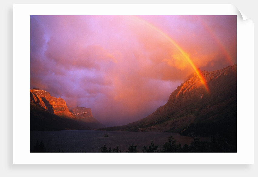 Rainbow and Clouds over a Valley by Anonymous