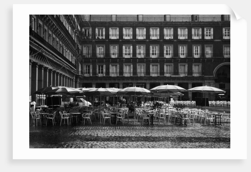 Raining on Cafe in Plaza Mayor by Corbis