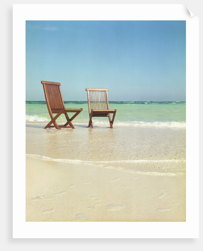 Pair of Wooden Lounge Chairs on Beach by Anonymous