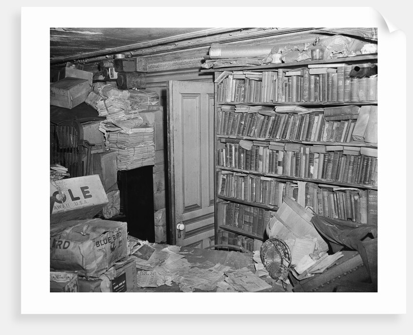 Interior View of a Room Full of Books and Cartons by Anonymous