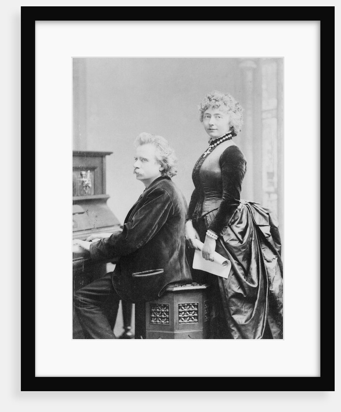Evard Grieg Playing Piano with Wife Looking On by Anonymous