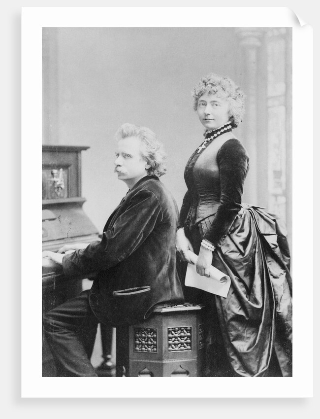 Evard Grieg Playing Piano with Wife Looking On by Anonymous