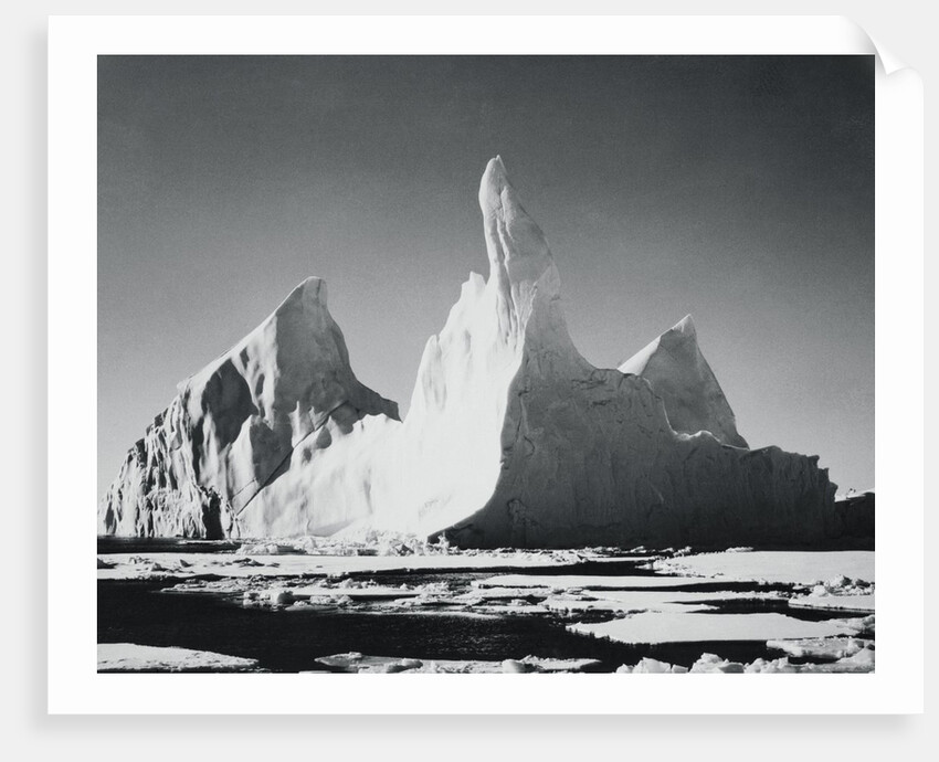 Iceberg Rising From Arctic Waters by Anonymous