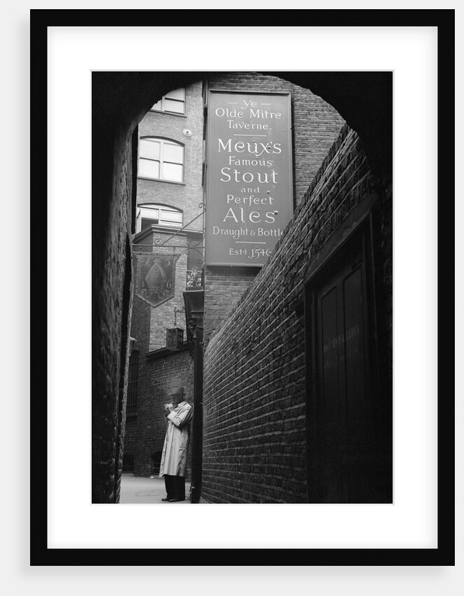 Man Outside Ye Olde Mitre Tavern by Anonymous