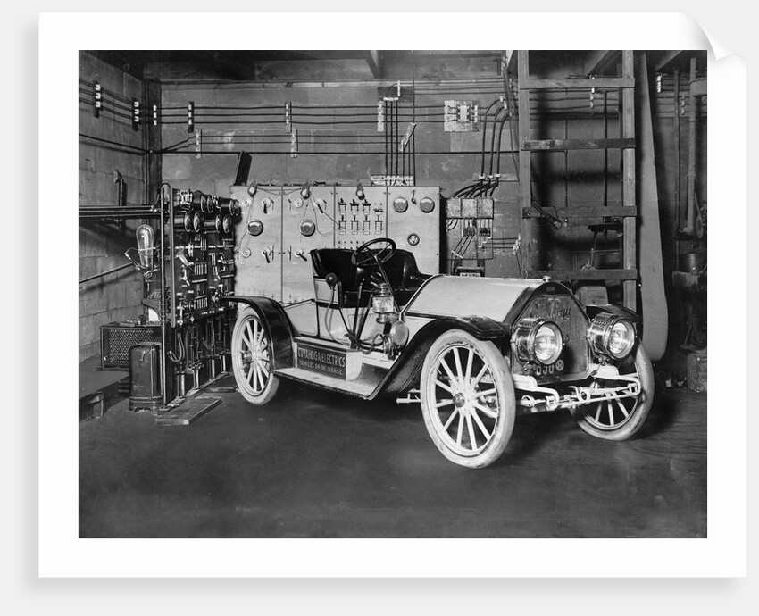 Electric Car at Charging Station by Anonymous