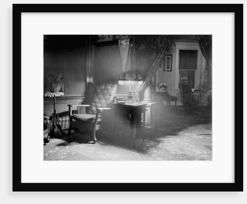 Lamp and Chair Inside Home by Anonymous