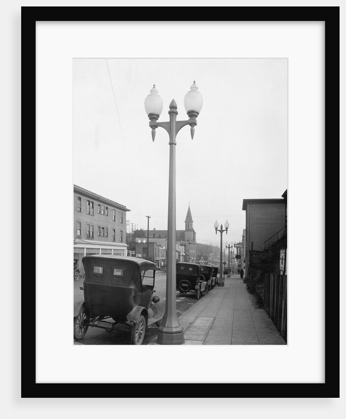 Ornamental Lights Along a Sidewalk by Anonymous
