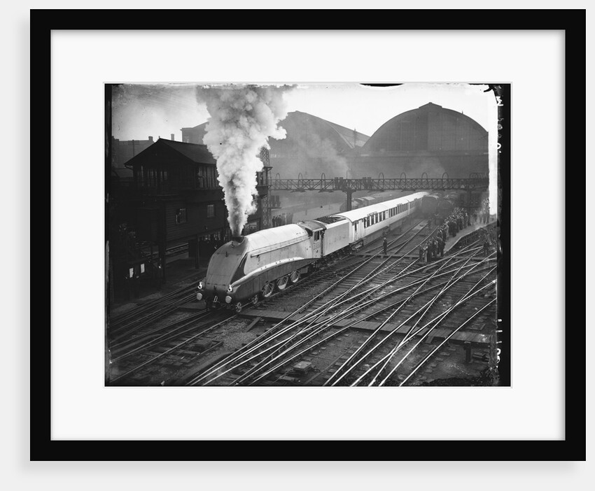 Silver Link Train Leaves King's Cross Station by Anonymous