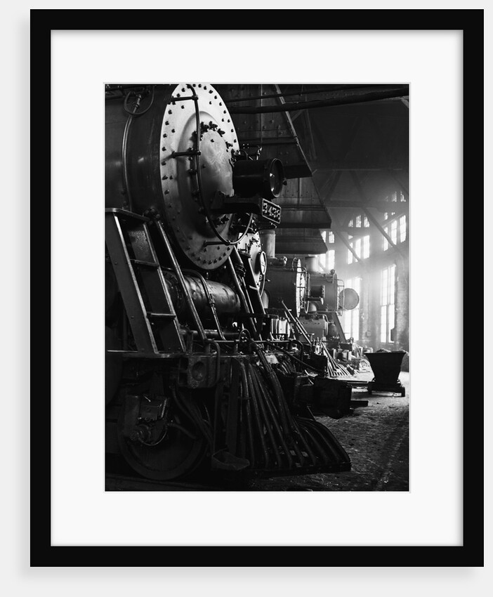 Locomotives in Roundhouse by Anonymous