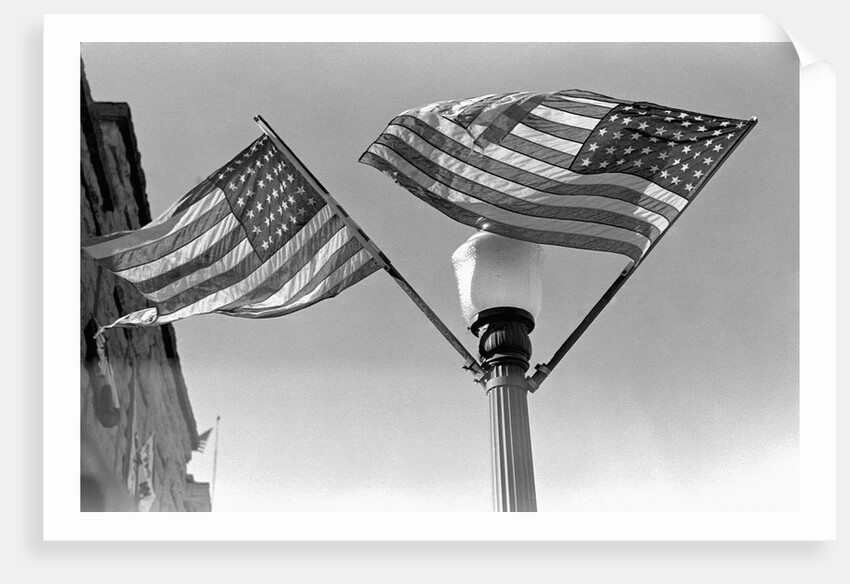 Flags on Lightpost by Anonymous
