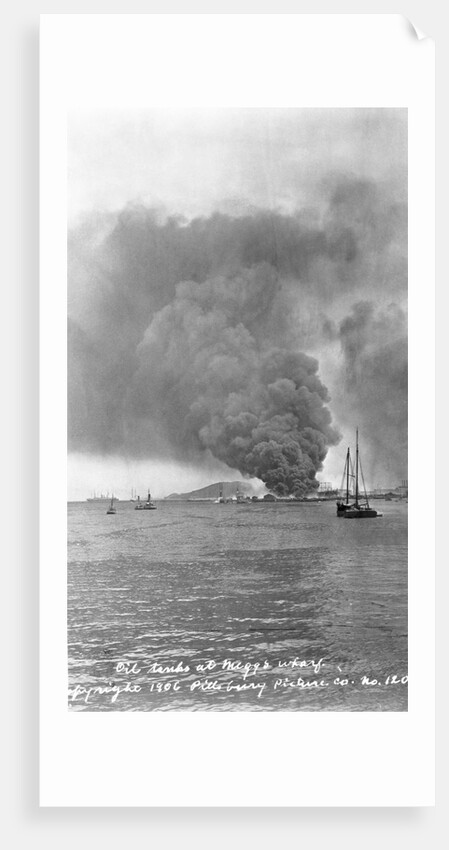 Thick Smoke Billows From Burning Oil Tanks by Anonymous