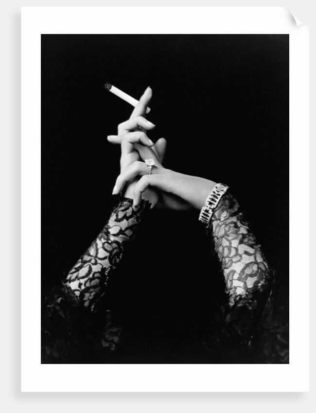 Woman's Hands Holding Cigarette by Anonymous