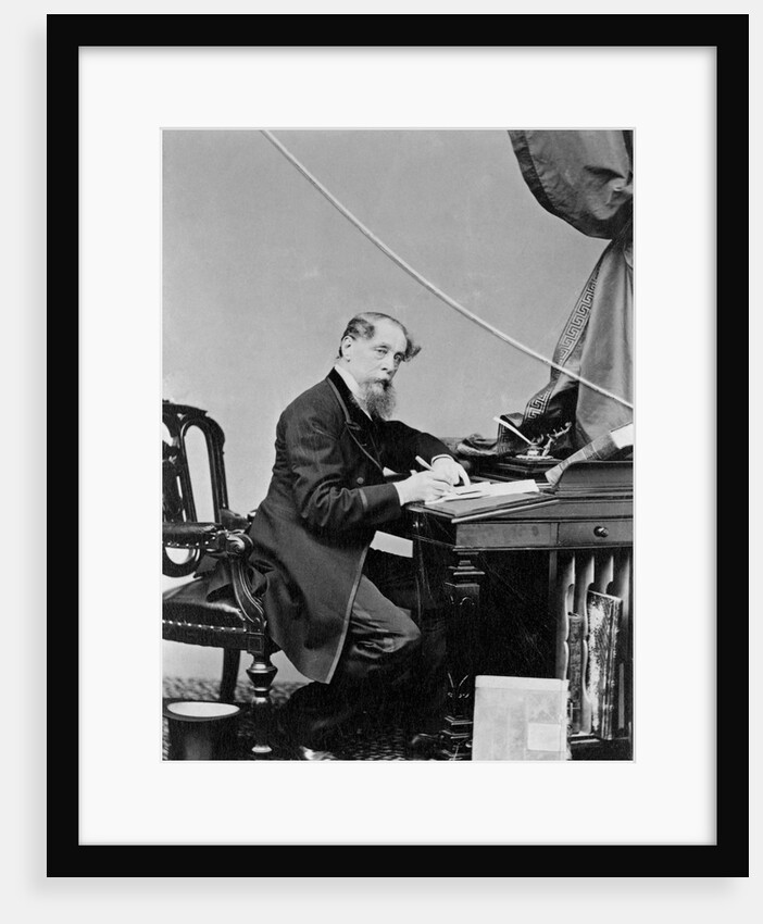 Charles Dickens Writing at Desk by Anonymous