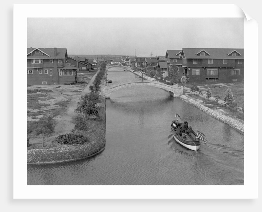 Boat on Aldebaran Canal Passing Houses in Venice, California by Anonymous