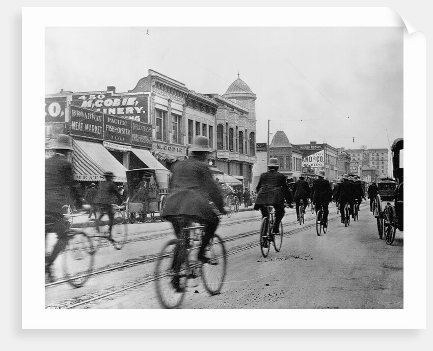 Los Angeles Police Officers Bicycling Past Broadway Storefronts by Anonymous