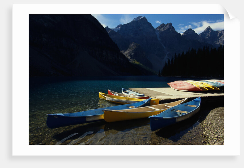 Canoes at Moraine Lake in Banff by Anonymous