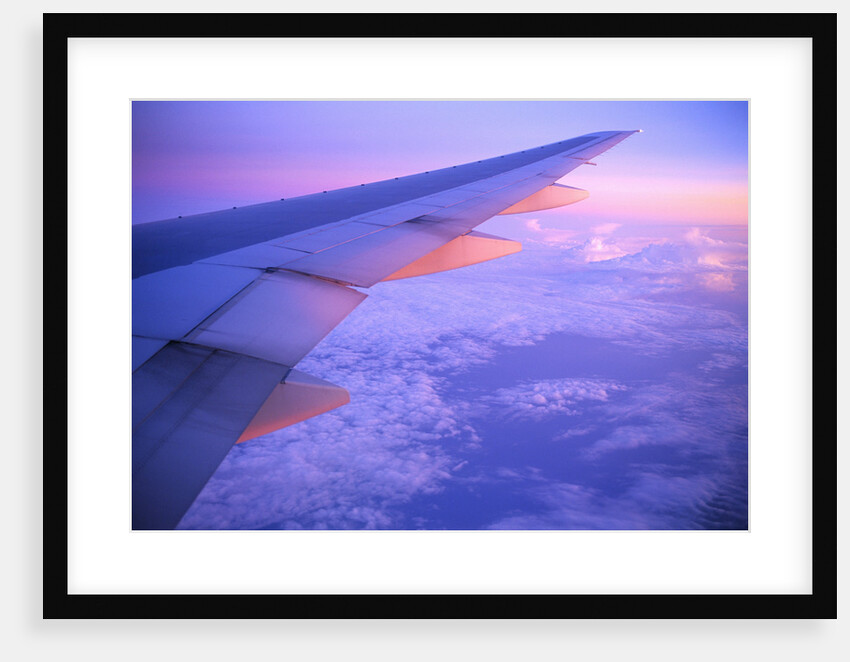 Setting Sun Hitting Airplane Wing by Anonymous