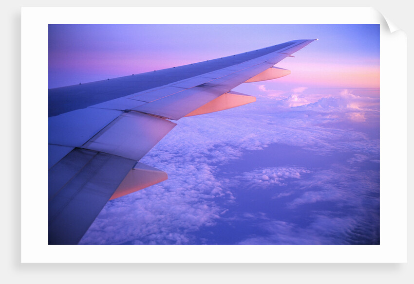Setting Sun Hitting Airplane Wing by Anonymous