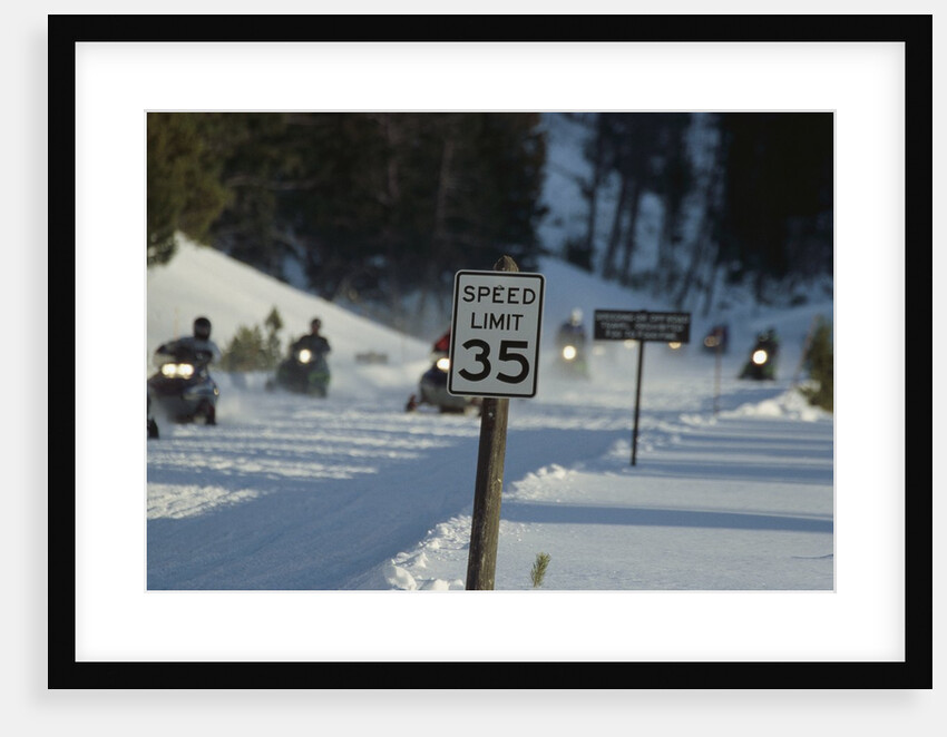 Speed Limit Sign and Snowmobiles by Anonymous