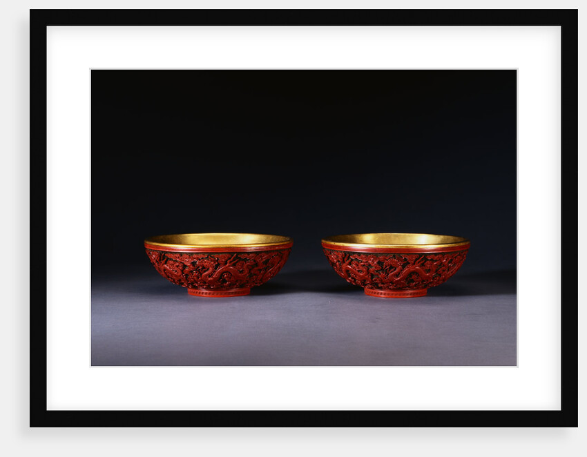 A Pair of Carved Red Lacquer Dragon Bowls by Anonymous