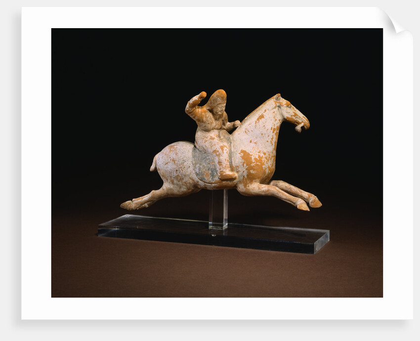 A Rare Painted Pottery Figure of a Female Polo Player by Anonymous