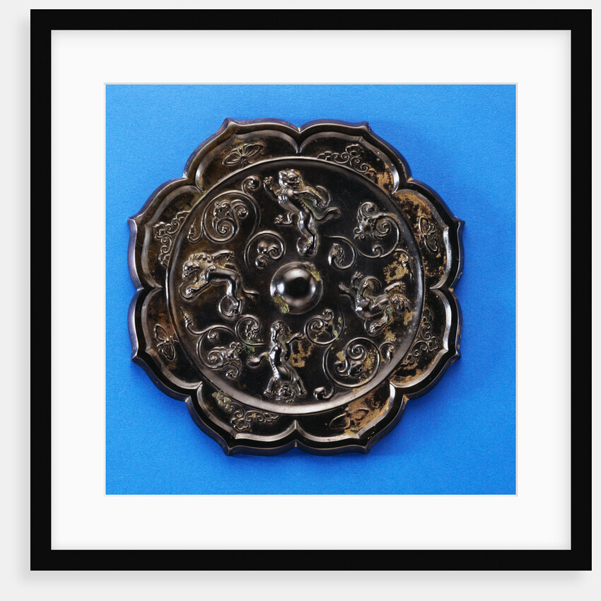 A Well-Cast Foliate Bronze Mirror. Tang Dynasty by Anonymous