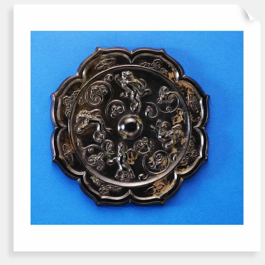 A Well-Cast Foliate Bronze Mirror. Tang Dynasty by Anonymous