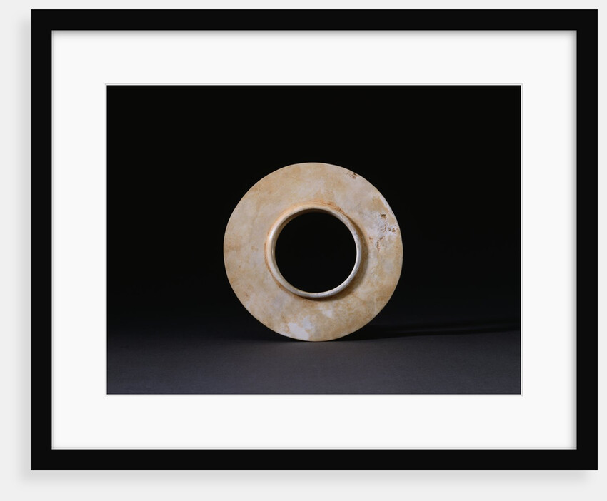 An Opaque Jade Collared Disc. Shang Dynasty by Anonymous