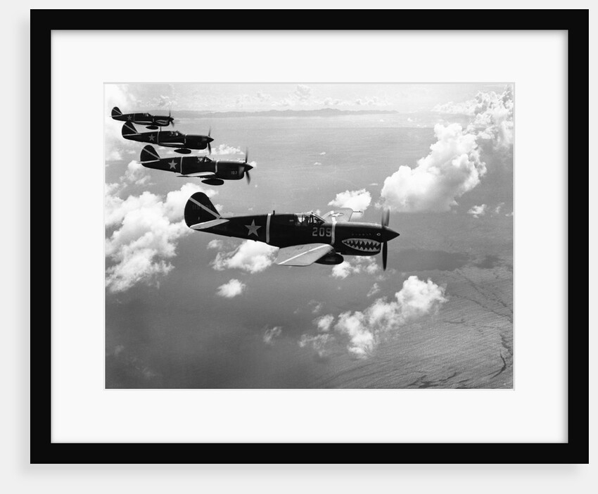 Curtiss P-40E "Warhawks" in Flight by Anonymous