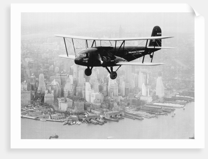 Airplane Flying Near Manhattan by Anonymous