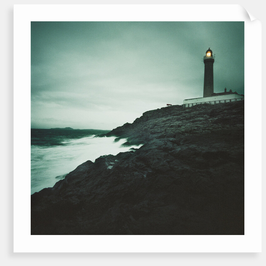 Lighthouse Beacon During a Storm by Anonymous