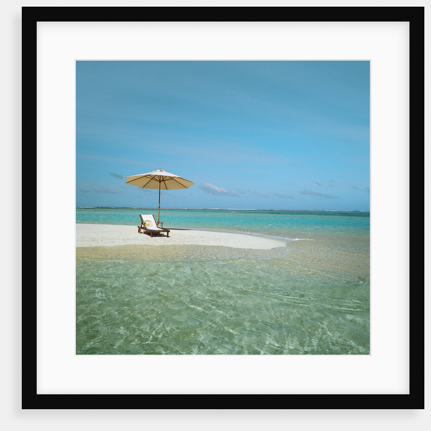 Umbrella and Beach Chair on the Beach by Anonymous