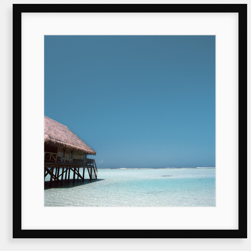Beach Hut Over Shallow Water by Anonymous