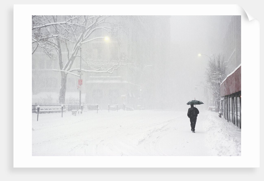 Pedestrian Walking Along Snowy Street by Anonymous