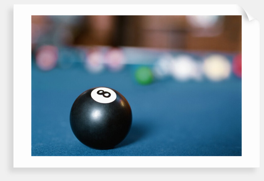 Eight ball on pool table by Anonymous