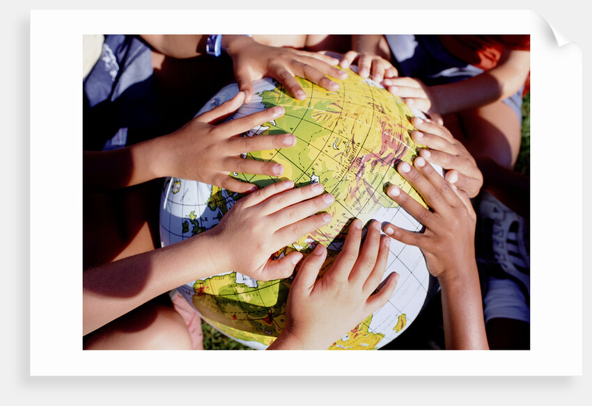 Children's Hands on Inflatable Globe by Anonymous